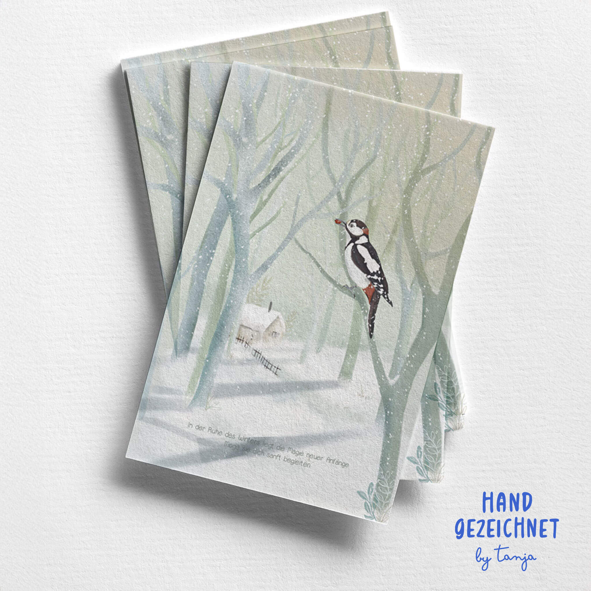 Handgezeichnete Postkarte mit Winterlandschaft und Specht