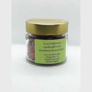 Kürbiskerne mit Himbeerkuvertüre