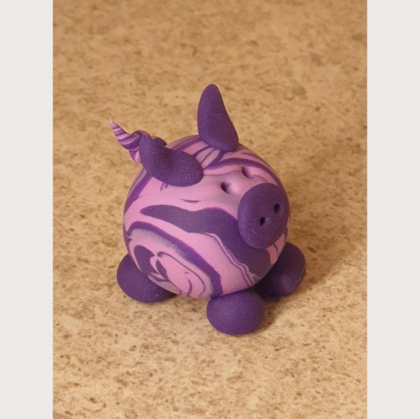 Glücksschweinchen aus Fimo hell-/dunkellila