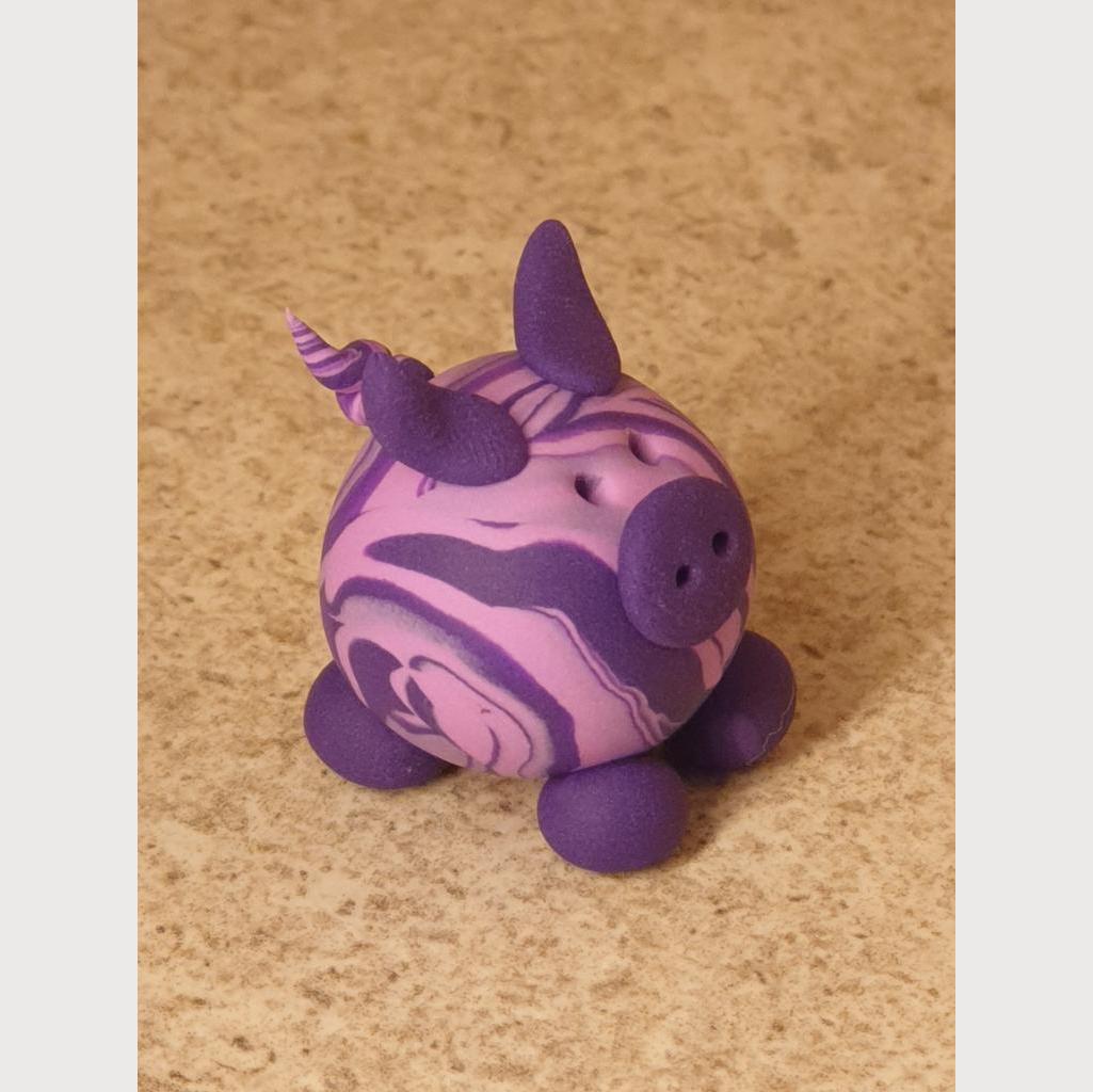 Glücksschweinchen aus Fimo hell-/dunkellila