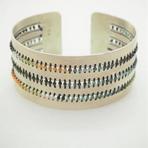 Verwickelt Armreifen