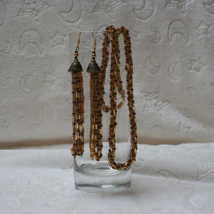 Schmuckset aus goldgelben Stabperlen und Roncailles