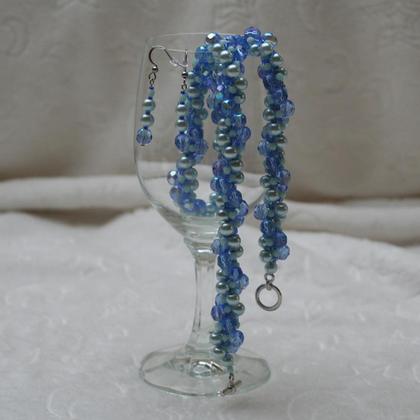 Schmuckset aus türkisen Wachsperlen und blauen Feuerperlen
